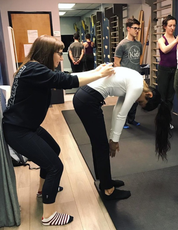 A physiotherapist performing Scoliosis on a patient